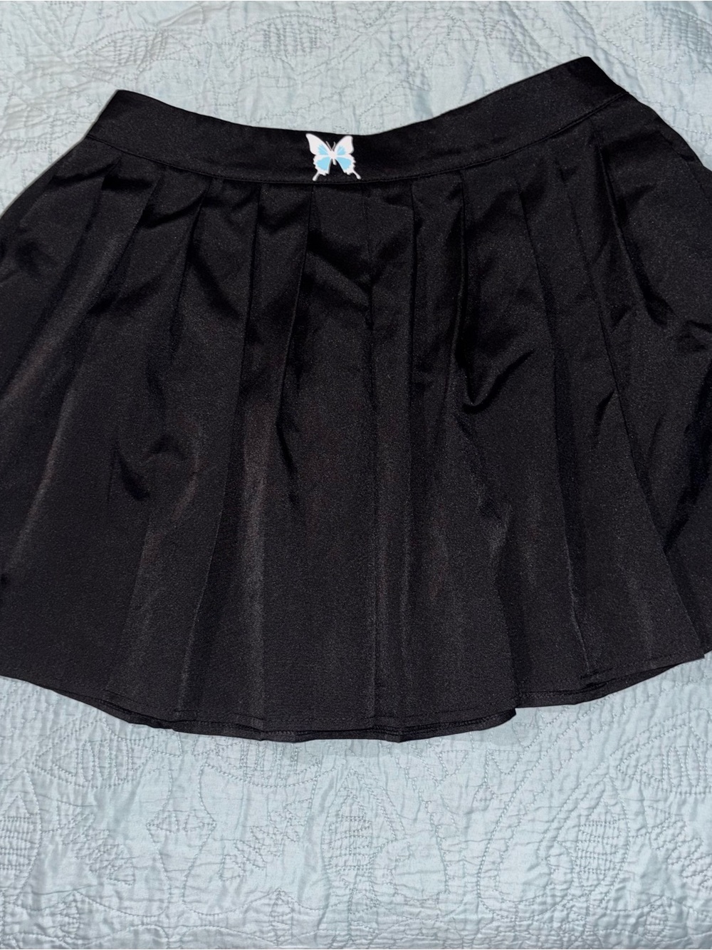 SHEIN Black Pleated Skater Skirt with Small Blue Butterfly